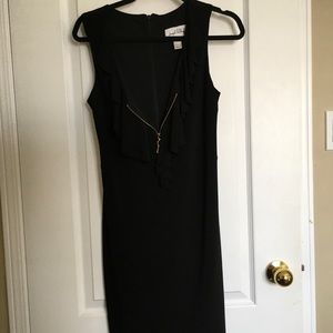 Black dress with gold front zipper. Classic Joseph Ribkoff like new. Worn once.